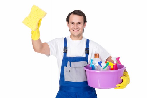 Professional cleaner in Waterloo performing detailed surface cleaning